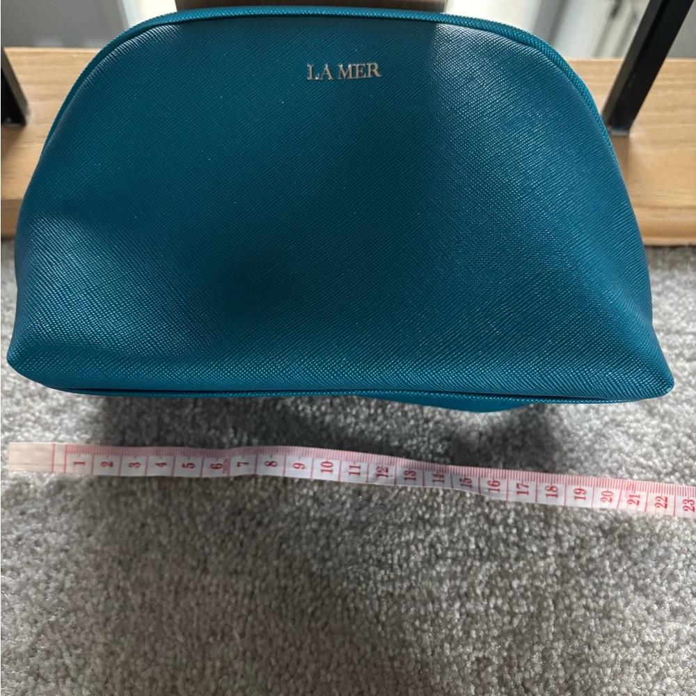 La Mer Blue Cosmetic Bag with Structured Design - Picture 1 of 3
